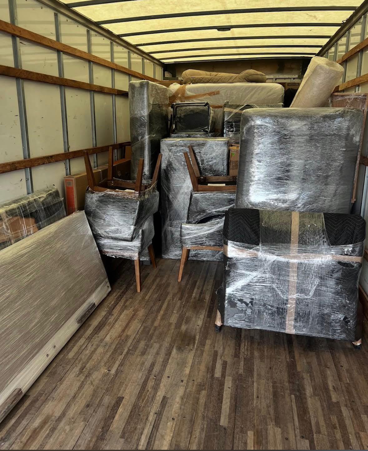 Professional commercial movers in Edmonton relocating office furniture